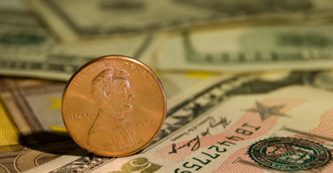 penny stocks dollar coin